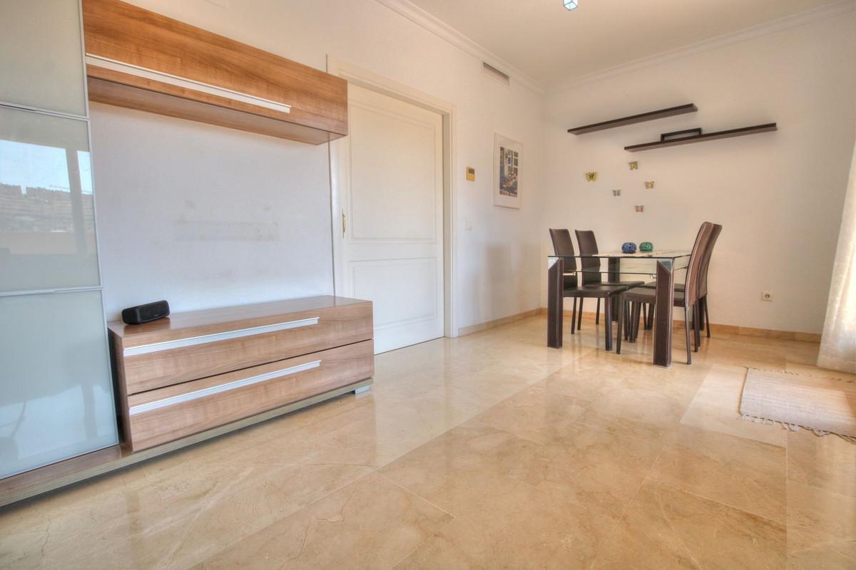 Penthouse with easy walk to La Cala de Mijas, featuring communal pool, paddle court, large terrace with sun all day, enclosed extra room, bright lounge, separate kitchen, en-suite bathroom, underground parking.