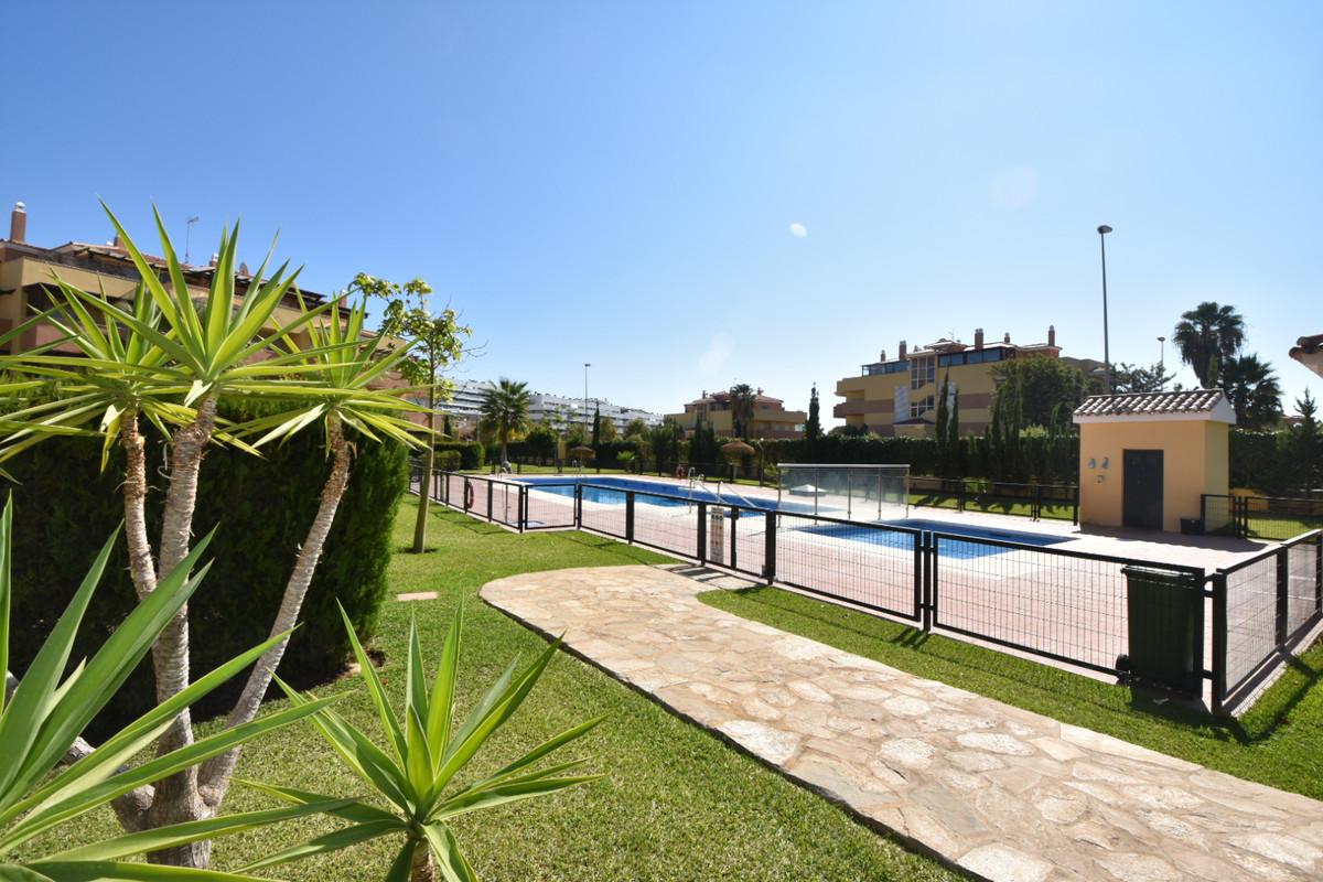 Penthouse with easy walk to La Cala de Mijas, featuring communal pool, paddle court, large terrace with sun all day, enclosed extra room, bright lounge, separate kitchen, en-suite bathroom, underground parking.