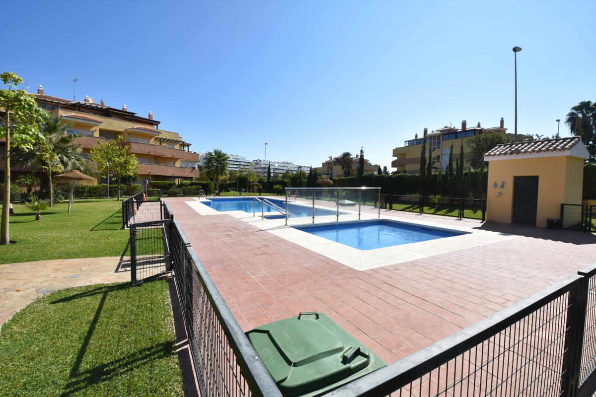 Penthouse with easy walk to La Cala de Mijas, featuring communal pool, paddle court, large terrace with sun all day, enclosed extra room, bright lounge, separate kitchen, en-suite bathroom, underground parking.