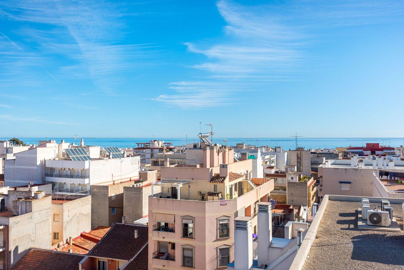 Modern coastal city building less than 500 meters from the beach in Guardamar del Segura. Features 2-3 bedroom homes with terraces, private solarium, storage room, Jacuzzi, underground parking, and commercial space.